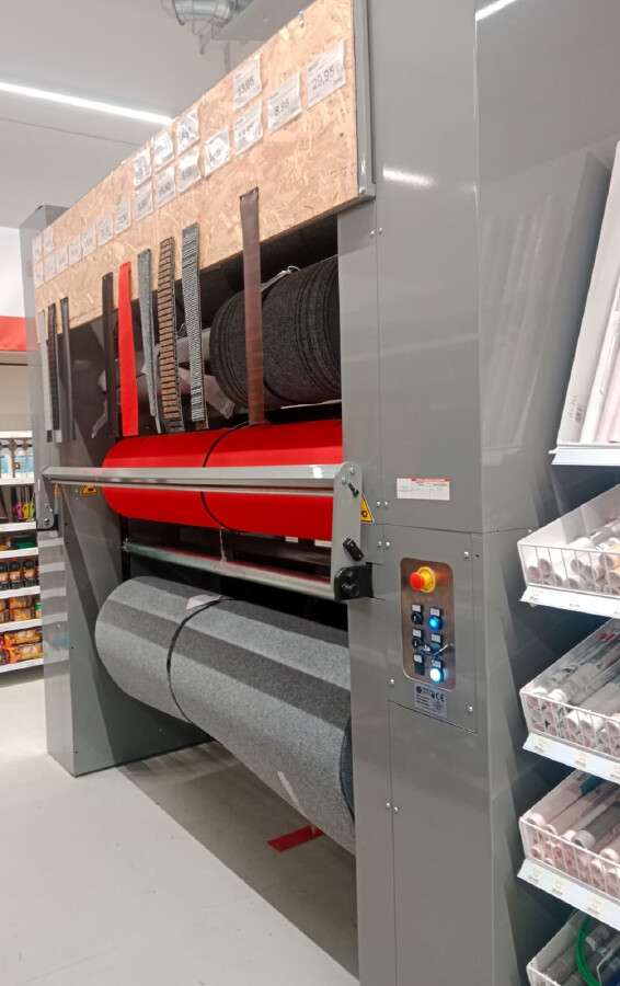 Espositore elettrico per rotoli